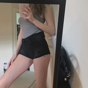 High waisted distressed black shorts